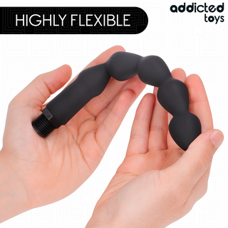 Analdusch med Adapter, 22 cm, silverfärgad metall, flexibel och böjd för att visa justerbarhet; Highly flexible-etikett ovan.