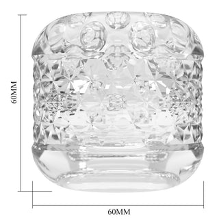 Transparent texturerad masturbator med två ändar, cylindrisk form, genomskinligt material, 60 mm höjd och bredd.