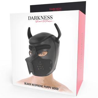 Box innehållande en svart valphuva i neopren med små öron och en nosliknande front. Förpackningen visar "Darkness Neopren Hundmask" och frasen "Welcome to the Pleasure", vilket tyder på spännande BDSM-lekar-äventyr.