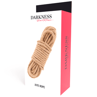 Darkness Japanese Jute Rope-lådan har en bild av lindat jute-rep, som antyder dess BDSM-tjusning. Den övervägande vita förpackningen med en rosa sidopanel framhäver subtilt dess specialitet, med "Jute Rope" elegant visad i botten.
