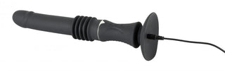 You2Toys Bärbar Sexmaskin är en elegant, svart, cylindrisk handhållen enhet med en räfflad textur och sladd vid basen, som erbjuder 7 vibrationslägen för olika nöjen.