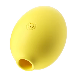Gul, ovalformad silikonvibrator med strömsymbol och liten öppning, mot vit bakgrund.