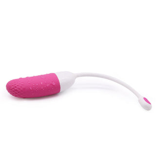 Magic Motion Vini - Vibrerande Ägg är en rosa och vit flexibel personlig massageapparat med en texturerad spets, designad för lugnande lindring. Styr din upplevelse med denna appstyrt sexleksak för optimal njutning.