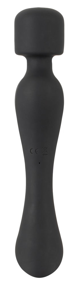 Warming Magic Wand, en elegant svart handhållen massageapparat med en rundad topp och ergonomisk design, är vattentät och står elegant mot en vit bakgrund.