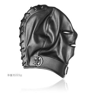 BondagMask Med Dragkedja är en svart mask gjord av PU-läder, som visar intrikata spetsar, dragkedjor och spännen i profilvy.