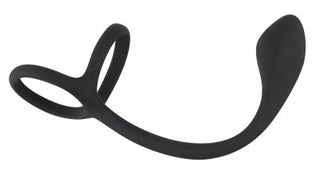 Ett elegant svart silikonföremål med dubbla öglor som heter "Penis & Pungring Med Buttplug", med en lökformad ände - perfekt för dem som utforskar silikonsexleksaker.
