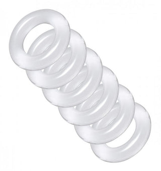 Ball Stretcher Kit har sex genomskinliga vita gummiringar, elegant arrangerade diagonalt på en orörd vit bakgrund, som påminner om en elegant penisringstapel.