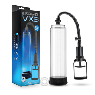 Penispump - Performance VX3, med ett elegant svart handtag och integrerad mätare, är elegant utställd vid sidan av sin förpackningslåda och designad för förbättrad prestanda.