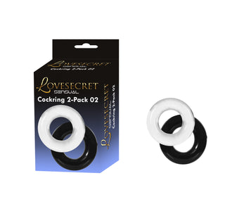 Cockring Duo Clear/Black har två sammankopplade ringar - en klar och en svart - som visas upp bredvid Lovesecret Sensual-förpackningen, en snygg accessoar som är utformad för att förbättra din intima upplevelse.