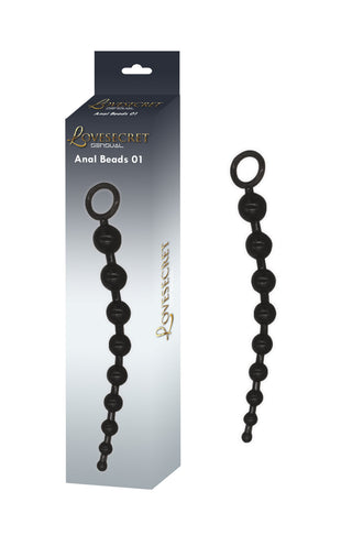 Analkulor LS24 30 cm: Analpärlor i svart silikon av flexibelt material med ett handtag i form av en ögla, idealiska för nybörjare. Visas bredvid sin förpackning märkt Love Secret Anal Beads 01.