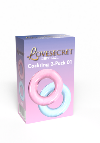 Box märkt Cockring Duo Pink/Blue med två penisringar i rosa och blått på en lila gradientbakgrund.