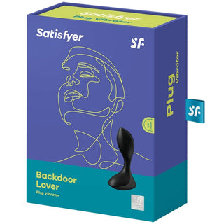 Satisfyer Backdoor Lover kommer i en elegant blå låda med en abstrakt ansiktsillustration och produktbild. Denna mångsidiga silikondesign fungerar som både buttplug och prostatavibrator, vilket garanterar överseende upplevelser varje gång.