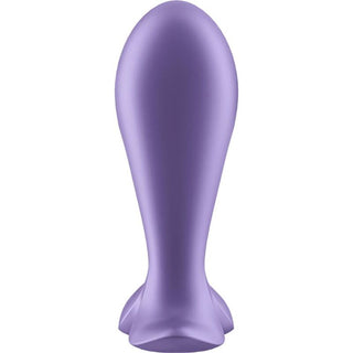 En lila ballong formad som en fiskfena, som liknar en Satisfyer Intensity Plug App, ses från sidan mot en vit bakgrund.