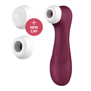 Den rödbruna Satisfyer Pro 2 Next Generation 3 Connect har en elegant, böjd design för personligt välbefinnande och inkluderar tre utbytbara vita kepsar, en märkt "New Cap" i en röd cirkel.