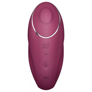 Rödbrun 2-i-1-vibrator med tre knappar, silverfärgad accent och slät yta, visas på en vit bakgrund.
