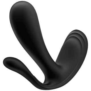 Satisfyer Top Secret + är en elegant, blank svart skulptur med släta, böjda former som skapar en dynamisk och flytande form mot en vit bakgrund.
