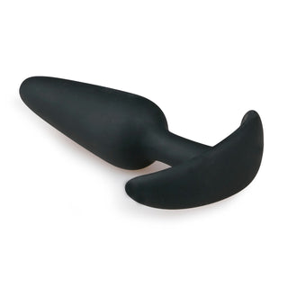 Vi introducerar Easytoys Anchor Buttplug: en svart, ankarformad design gjord av hudvänlig silikon, med en avsmalnande spets och utsvängd bas för enkel hantering. Ställd mot en orörd vit bakgrund, blandar denna produkt elegans med komfort.