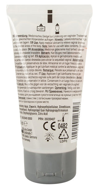 Bakifrån av en 50 ml tub med Just Glide Performance, som visar produktinformation och ingredienser på flera språk, vilket betonar dess unika hybridform för långvarig släthet.