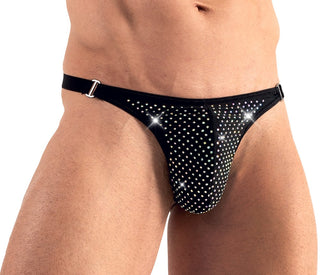 Person som bär "Stringkalsong med strass", gnistrande svarta underkläder med exklusiv design.