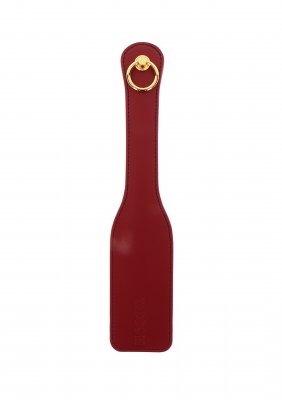 TabooM Paddle - Bondage är en lyxig paddel med rött läder och en guldring i handtagets ände, perfekt för intensiva BDSM-sessioner.
