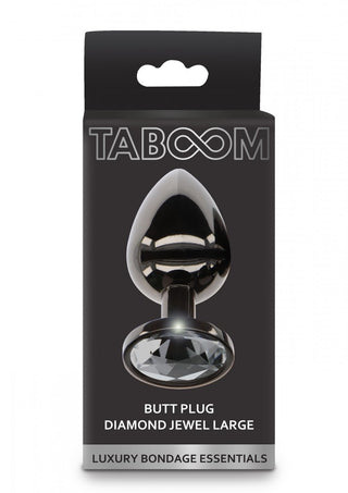 TabooM Analplugg Diamant Large presenteras i en lyxig förpackning med en slående silverbuttplug med en stor diamantpärla, perfekt för att förbättra din intima stimuleringsupplevelse.