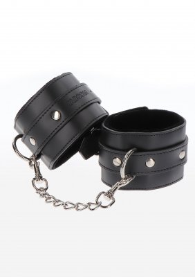 Upplev tjusningen med TabooM handledsmanschetter, gjorda av elegant svart läder och en robust metallkedja, perfekt för att utforska bondage fotbojor och lägga till en edgy vädjan till alla miljöer.
