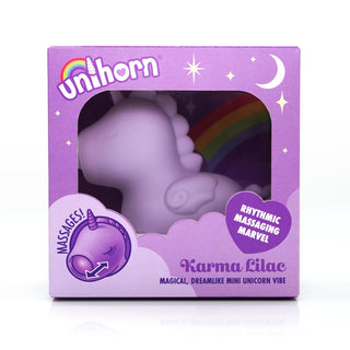 Unihorn Karma Vibrator Lilac, en enhörningsformad massageapparat, kommer i elegant lila förpackning och är gjord av kroppssäker silikon för en säker och förtrollande upplevelse.