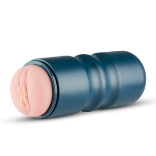 En blå onanileksak för män som heter Realistisk Vagina - FPPR, med en realistisk hudstruktur, står mot en vit bakgrund.