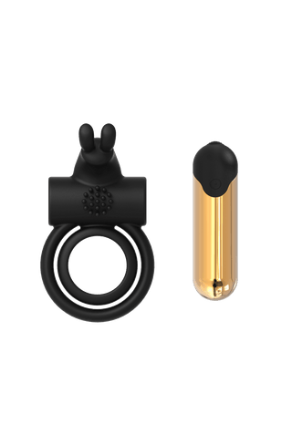 Elite Joel Penisring har en svart silikondesign med en kaninformad topp och inkluderar ett separat gyllene cylindriskt tillbehör som kombinerar lekfull estetik med premiummaterial.