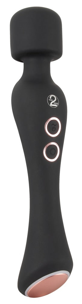 Warming Magic Wand är en mångsidig handhållen massageapparat med två kontrollknappar och ett rundat huvud. Dess svarta vattentäta design säkerställer lugnande avkoppling precis där du behöver det.