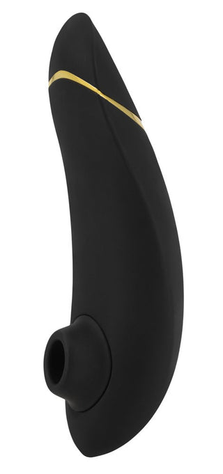 Womanizer Premium 2 är en svart ergonomisk massageapparat med en elegant, böjd design med en guldaccent nära toppen och använder avancerad Pleasure Air™-teknik för en förbättrad upplevelse.