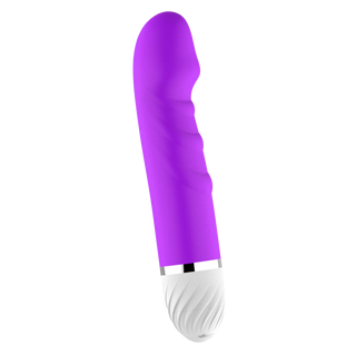 Ribbad vibrator i mjukt silikon med vridfunktion och justerbar vibration, rosa färg mot vit bakgrund.