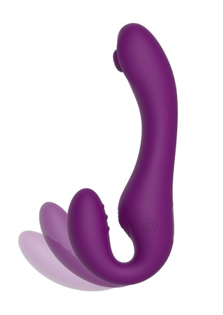 Strapless Strap-On Pulse-Vibe är en lila, böjd vuxenleksak gjord av kroppssäkert silikonmaterial med dubbla ändar för mångsidig användning.